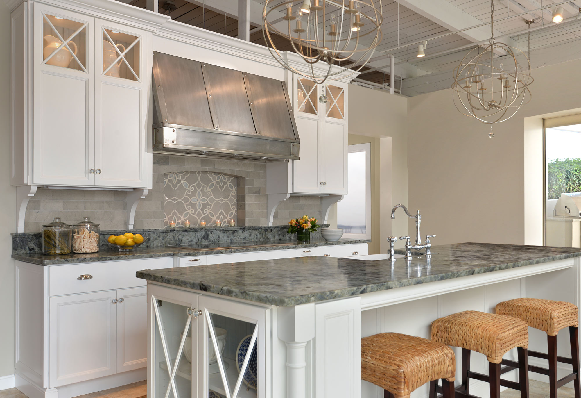 classic kitchen remodel in Amherst with white cabinets and large central island